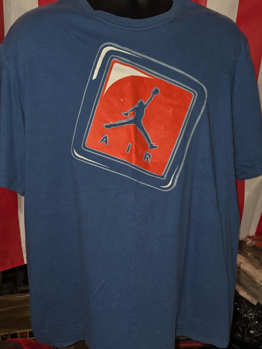 Nike Men’s Blue Short Sleeve Tee with Orange Jumpman Emblem